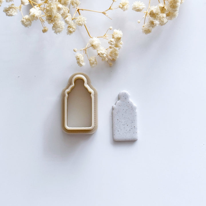 Baby bottle cutter - Goat Corp