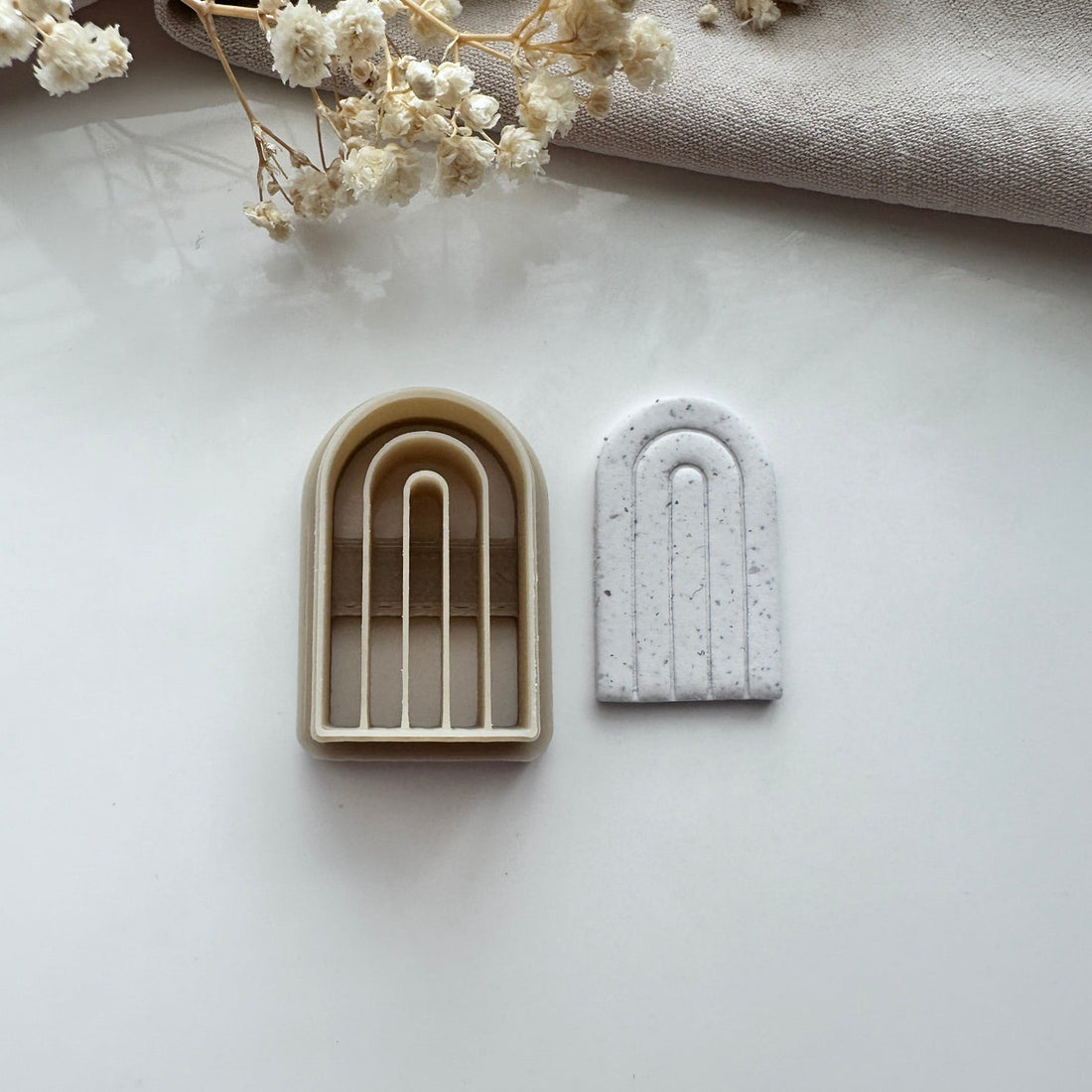 Bold embossed arch cutter - Goat Corp