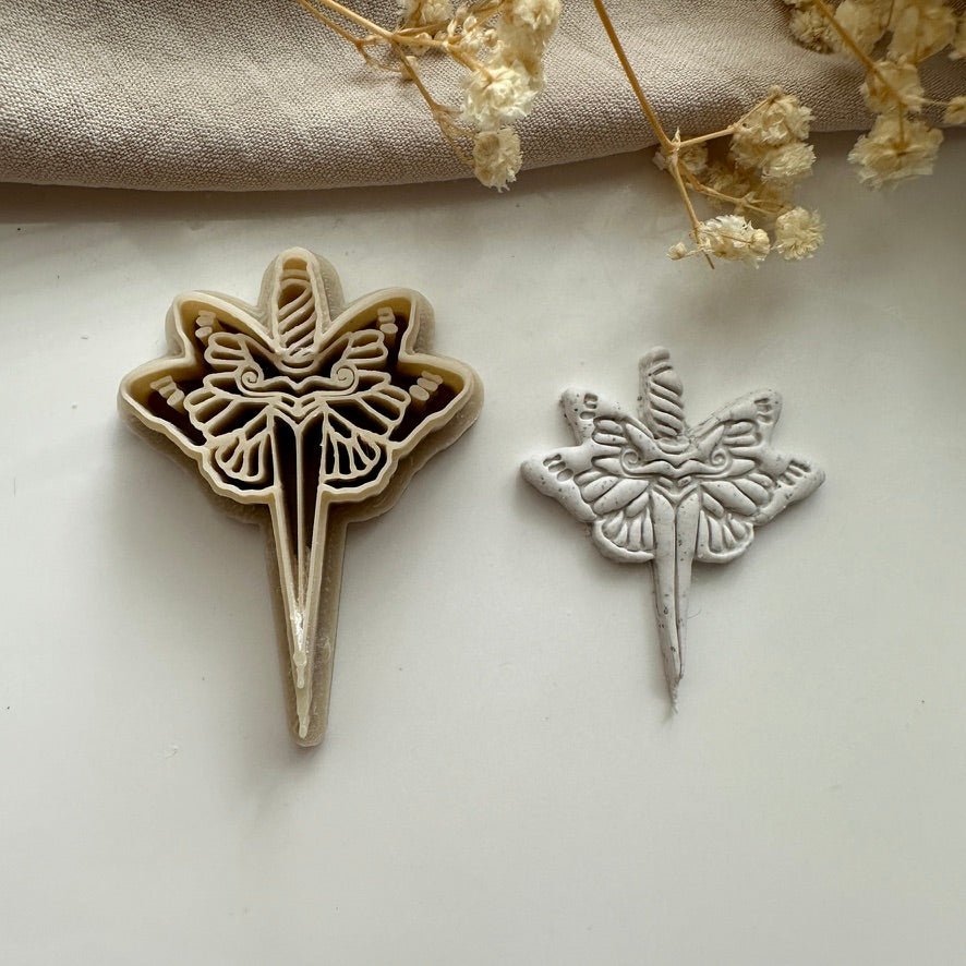 Butterfly and sword cutter - Goat Corp