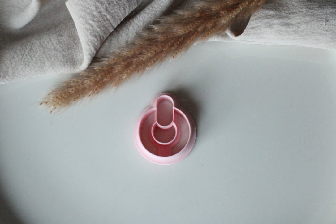 Circle oval embossed stud cutter - Goat Corp