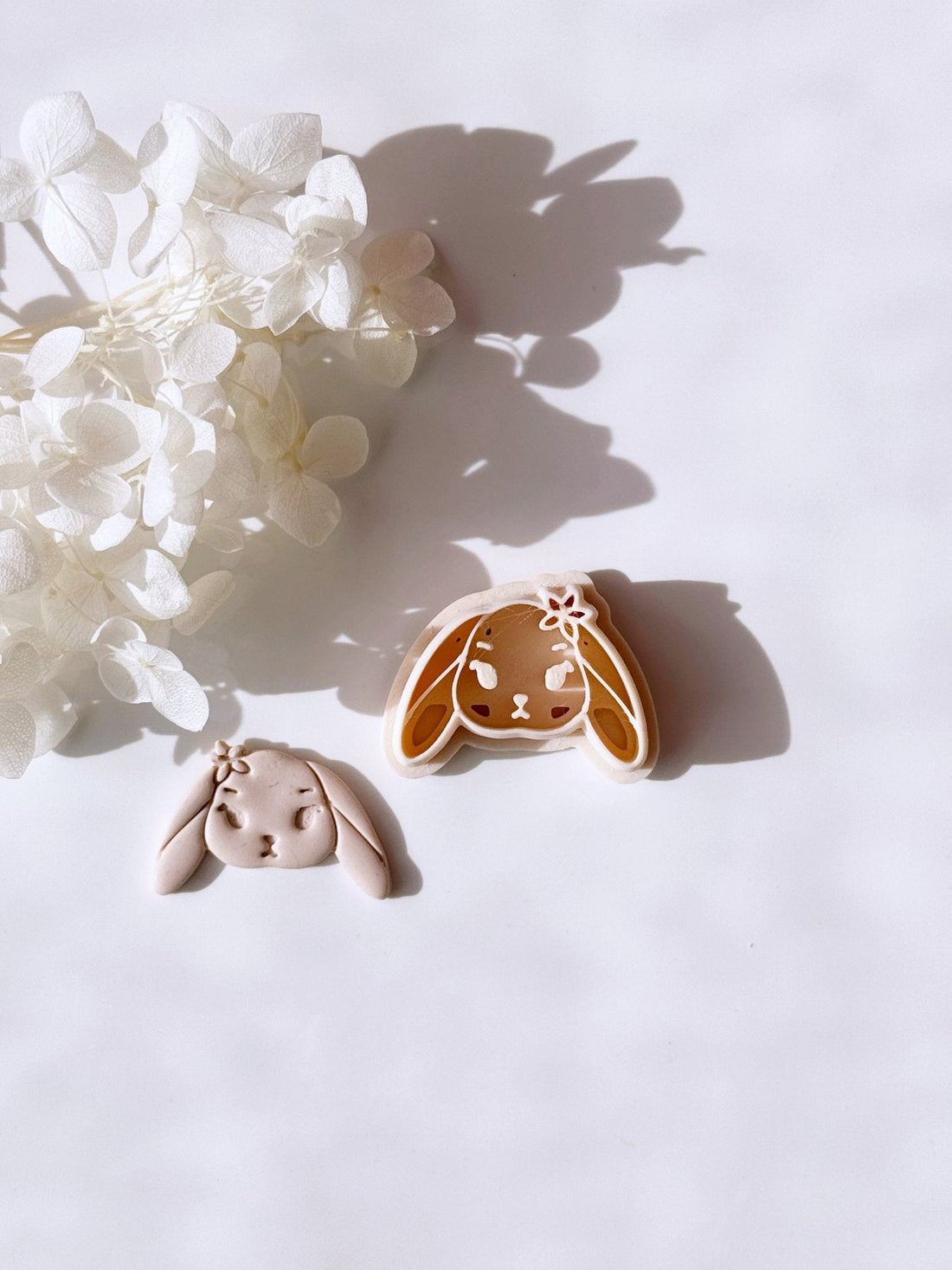 Cute bunny with floppy ears and flower cutter - Goat Corp