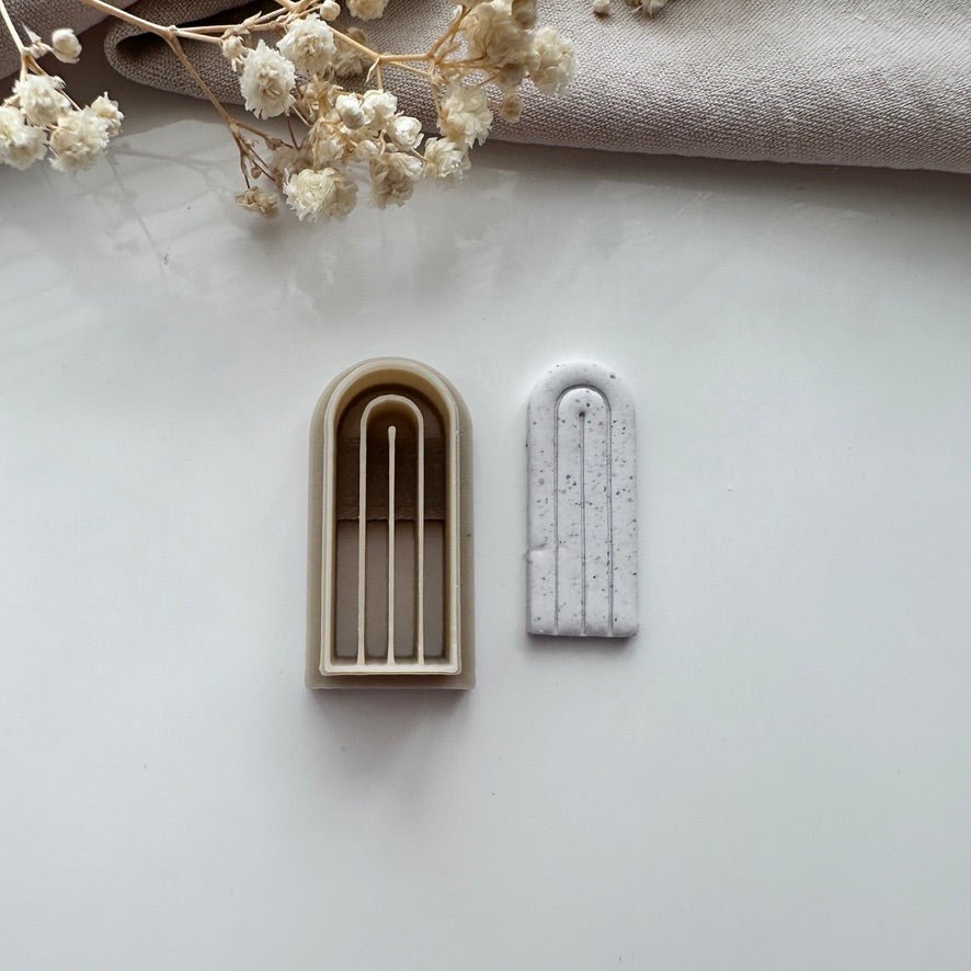 Embossed arch cutter - Goat Corp