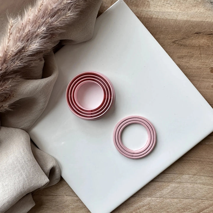 Extruded circle embossed cutter - Goat Corp