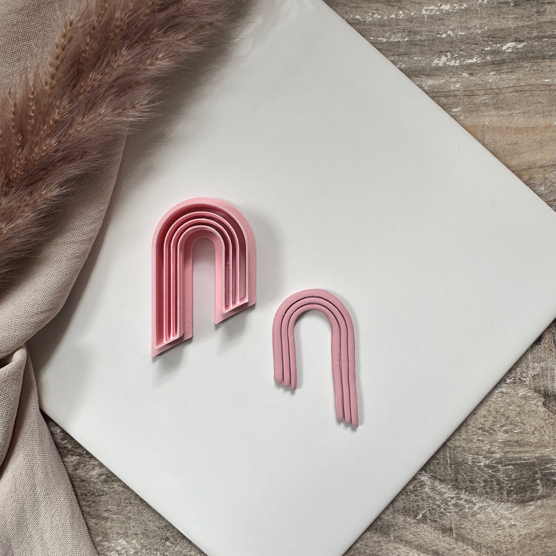 Extruded tapered arch - Goat Corp