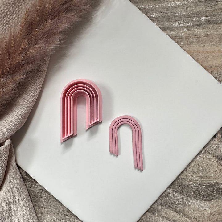 Extruded tapered arch - Goat Corp