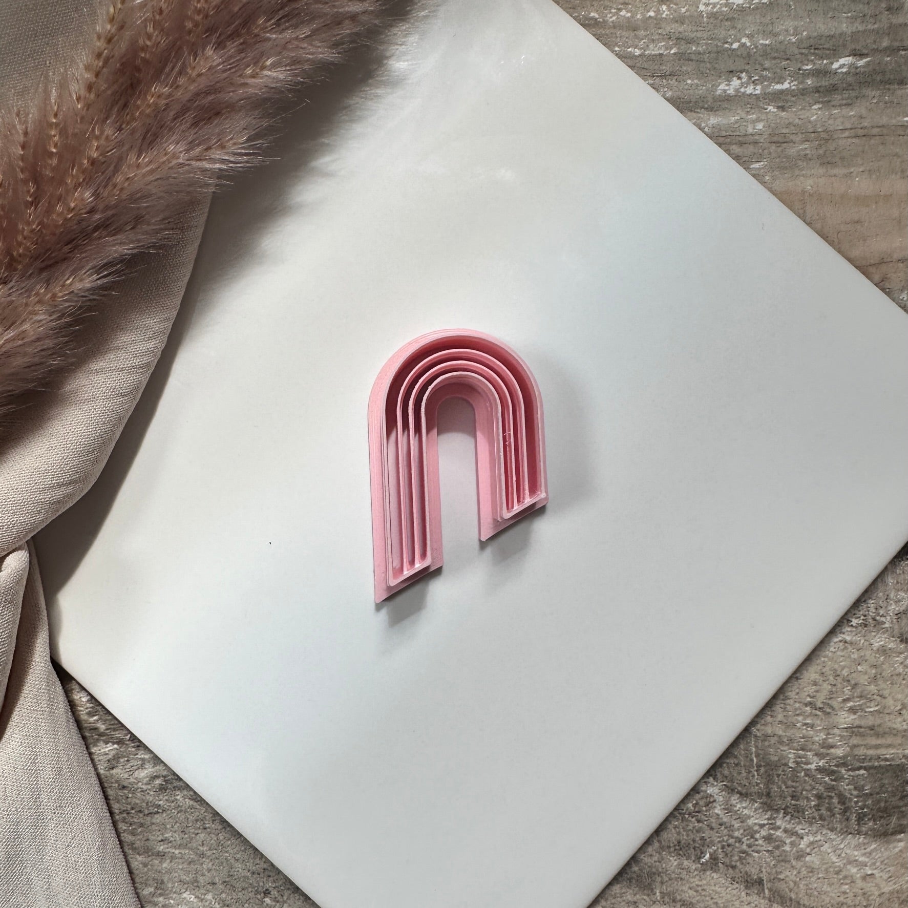 Extruded tapered arch - Goat Corp