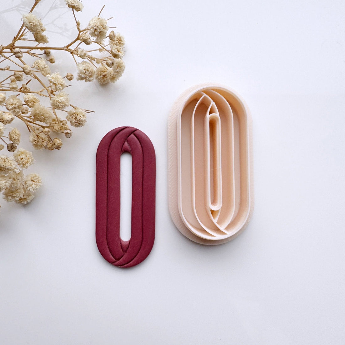 Fancy embossed long donut - Goat Corp