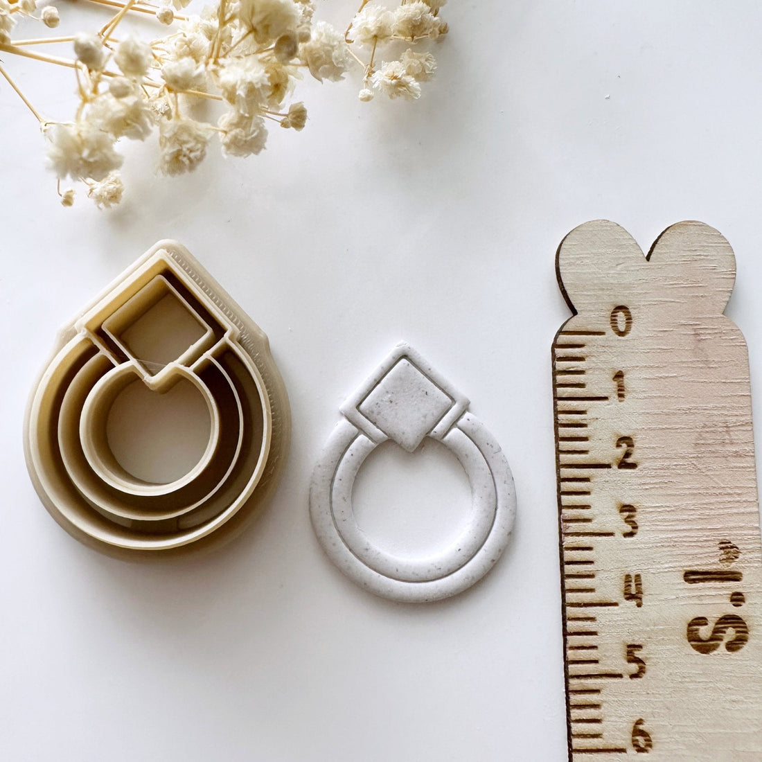 Round square stud embossed cutter - Goat Corp