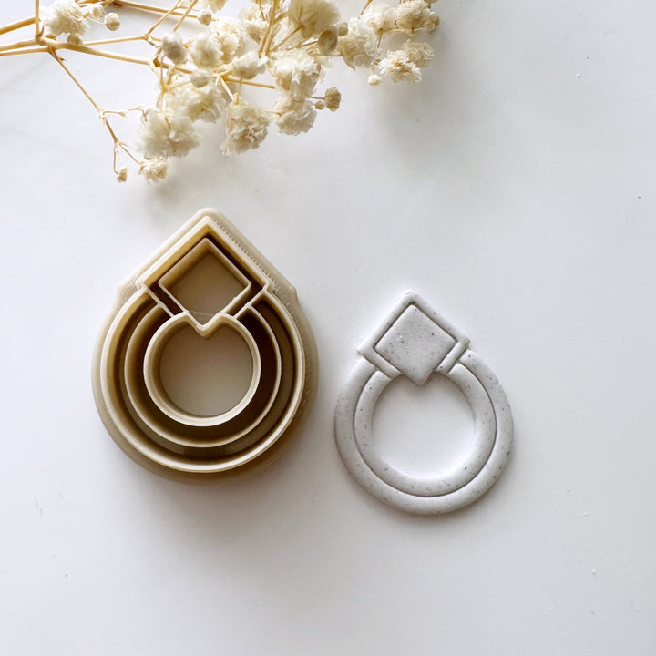 Round square stud embossed cutter - Goat Corp