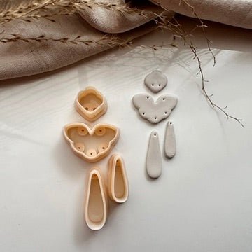 Scalloped arch drop and stud cutter set met boorhulp - Goat Corp